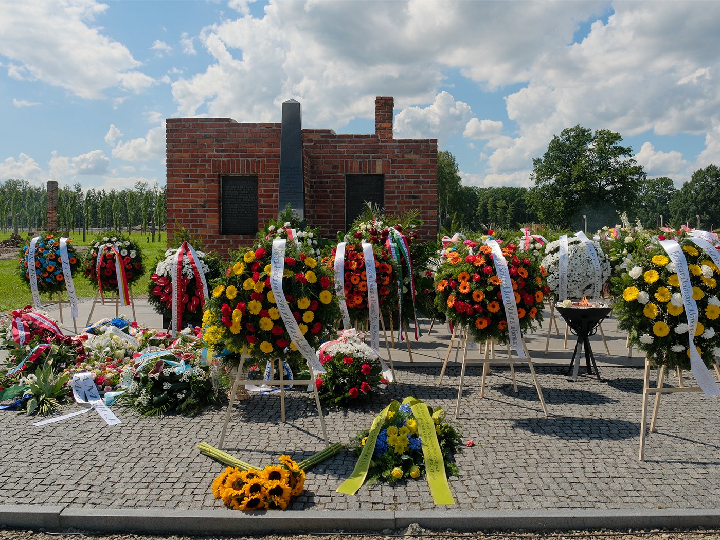 Flowers for Roma Holocaust Remembrance Day in Auschwitz